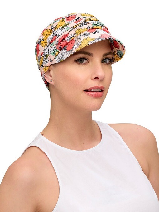 Stylish softie cap worn by a lady with total hair loss due to cancer