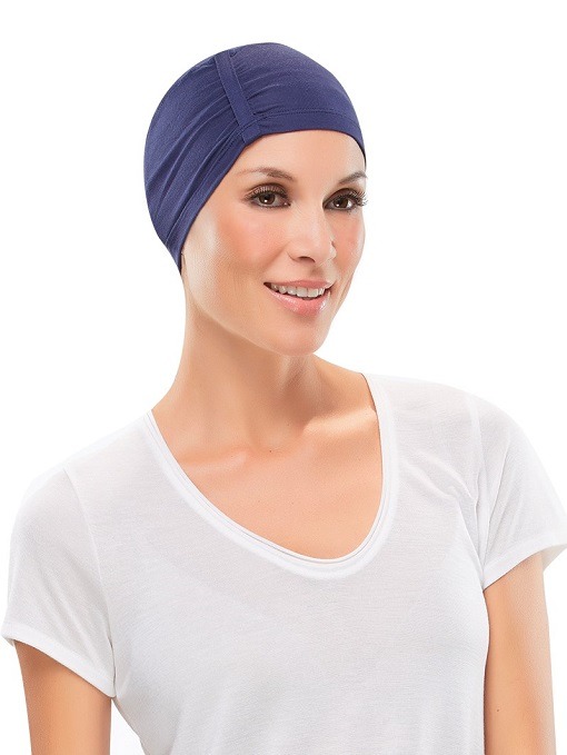 Lady wearing a blue head piece to keep her head warm
