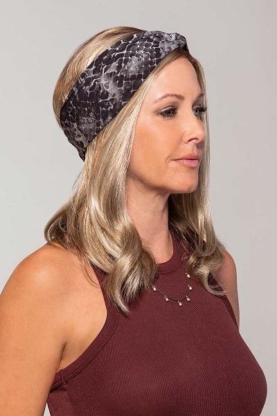 Snake print headwear on a women with hair loss