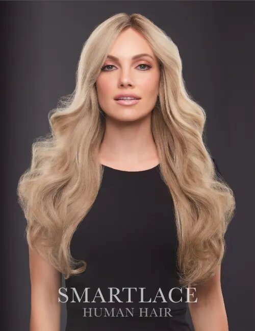 Lady with Alopecia wearing a long length human hair wig for her hair loss